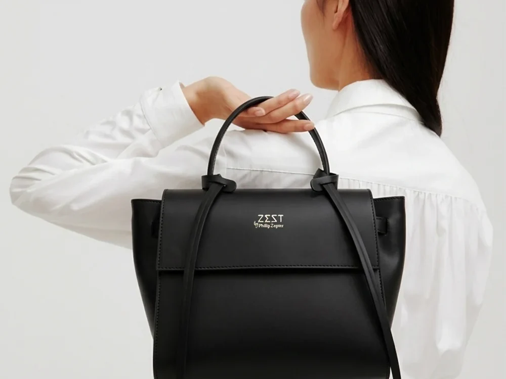 Structured Top Handle Flap Bag worn